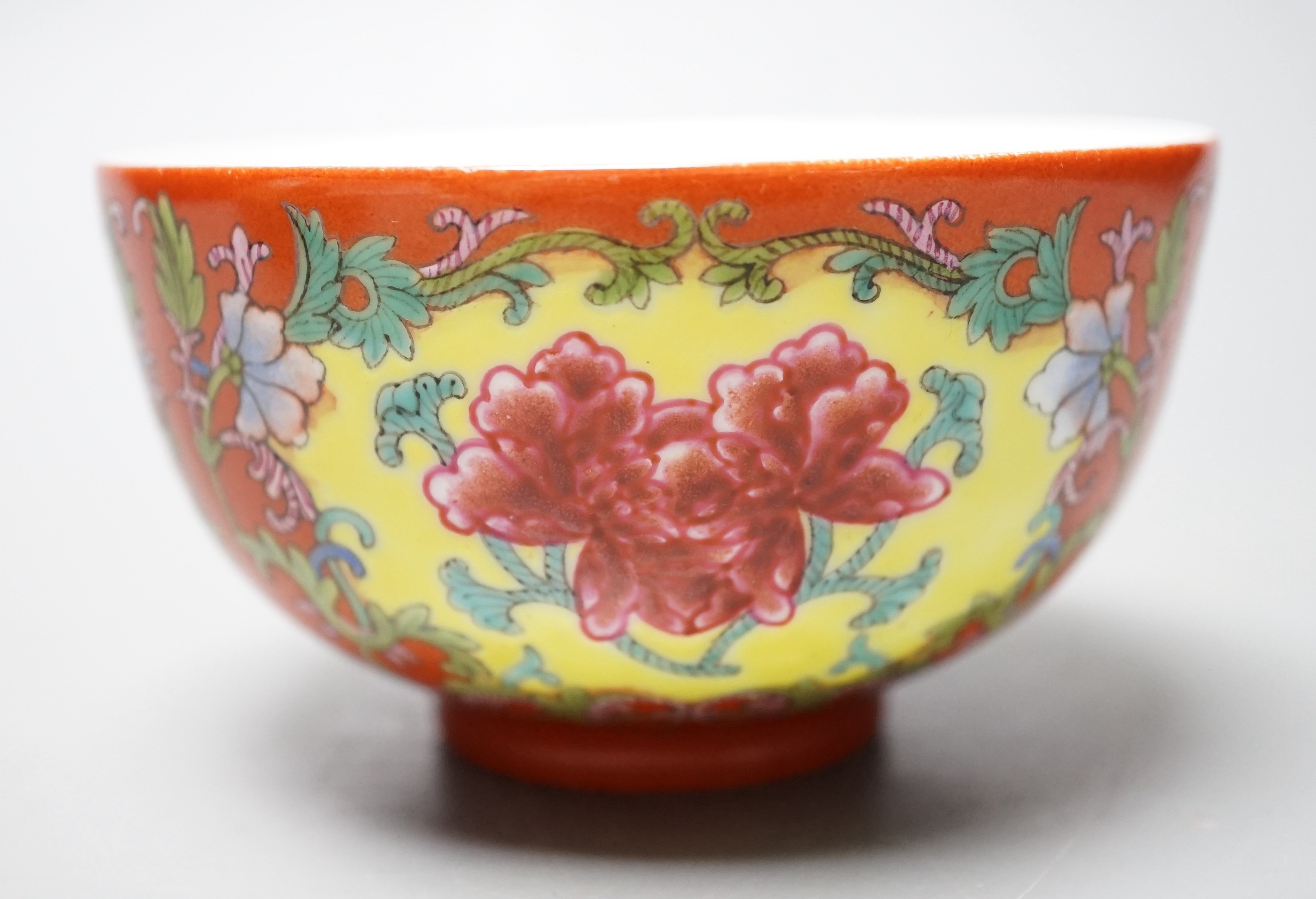 A Chinese famille rose coral ground bowl, 11cm diameter